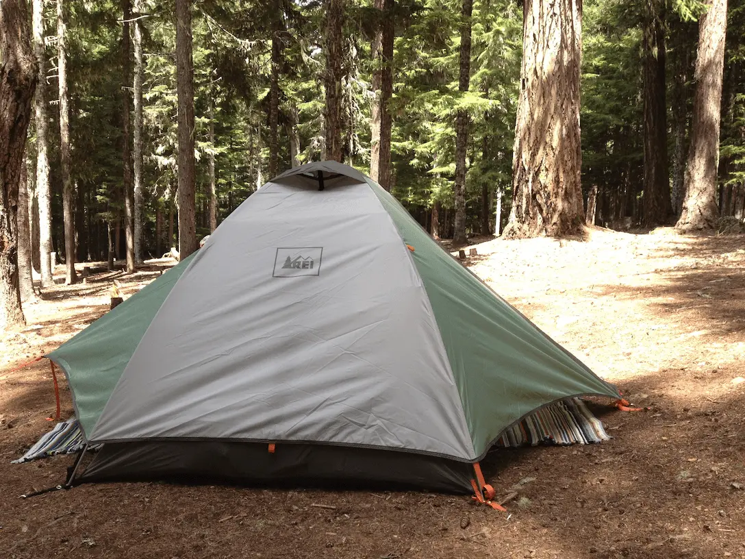 REI tent in the forest